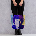 Image of a Woman hold a Tote bag of Music Legend and Rock Star Bob Dylan. Retro pop art tote bags for purchase online at Woodstock Vibe.